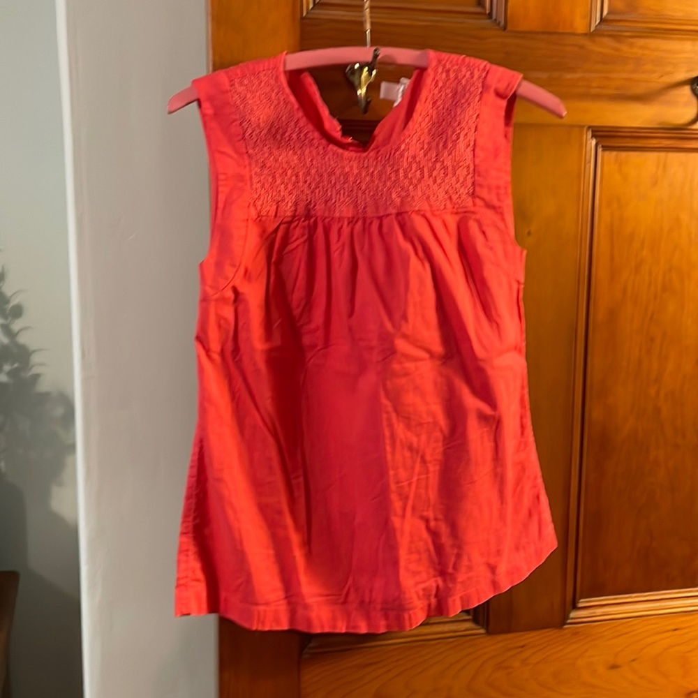 I Crew cotton top.  Orange/red color